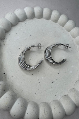 Ατσάλινα σκουλαρίκια πενταπλοί κρίκοι καρφωτά ασημί