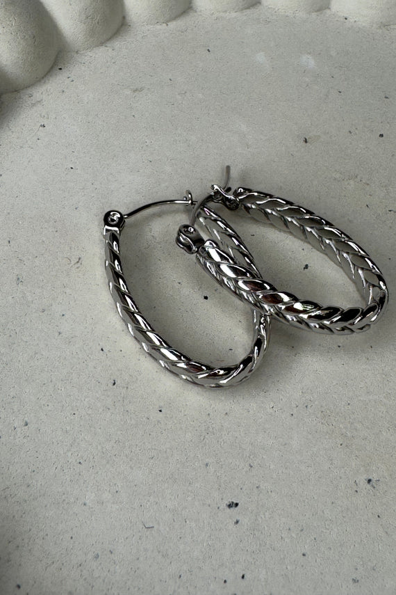 Ατσάλινα σκουλαρίκια κρίκοι ασημί οβάλ πλεκτοί