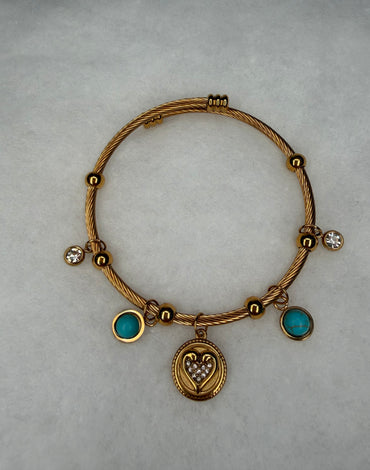 Ατσάλινη χειροπέδα χρυσή με κρεμαστά