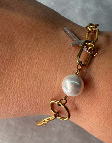 Ατσάλινo βραχιόλι με σταυρό και πέρλα