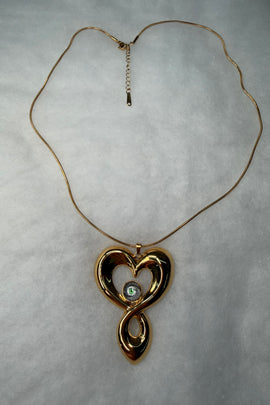 Ατσάλινο κολιέ χρυσό με καρδιά και αληθοφανές μάτι