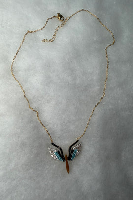 Ατσάλινο κολιέ χρυσό Bird με μαύρα, λευκά και γαλάζια κρύσταλλα